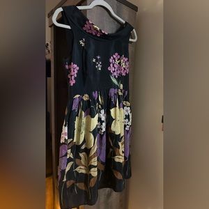 Dress is by coreylynncalter size 4 navy with different flowers